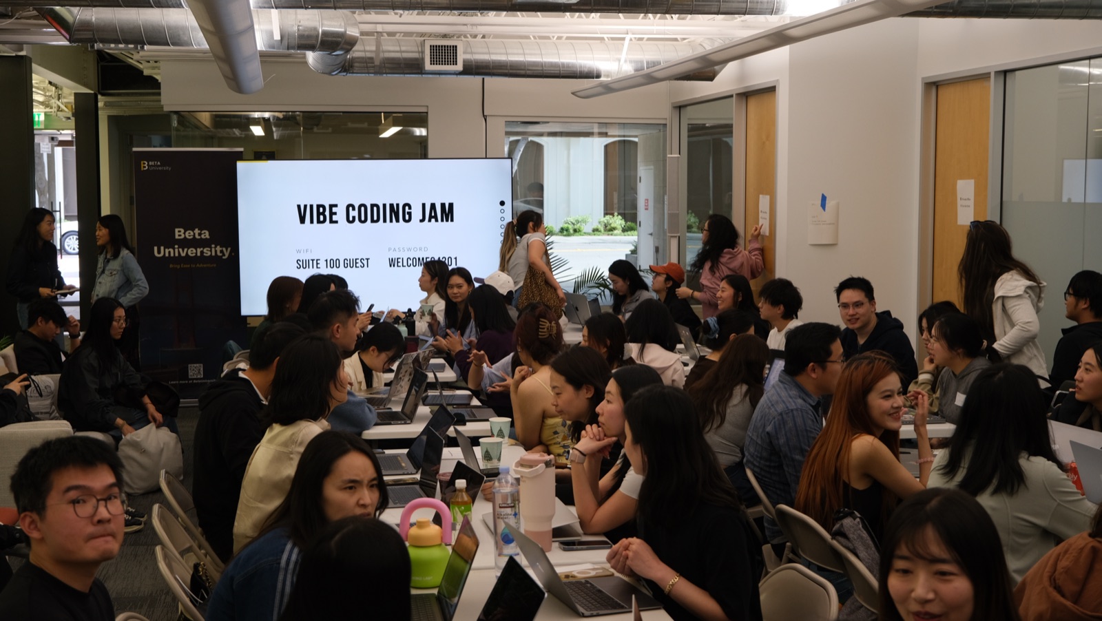 Attendees filling the room at Vibe Coding Jam